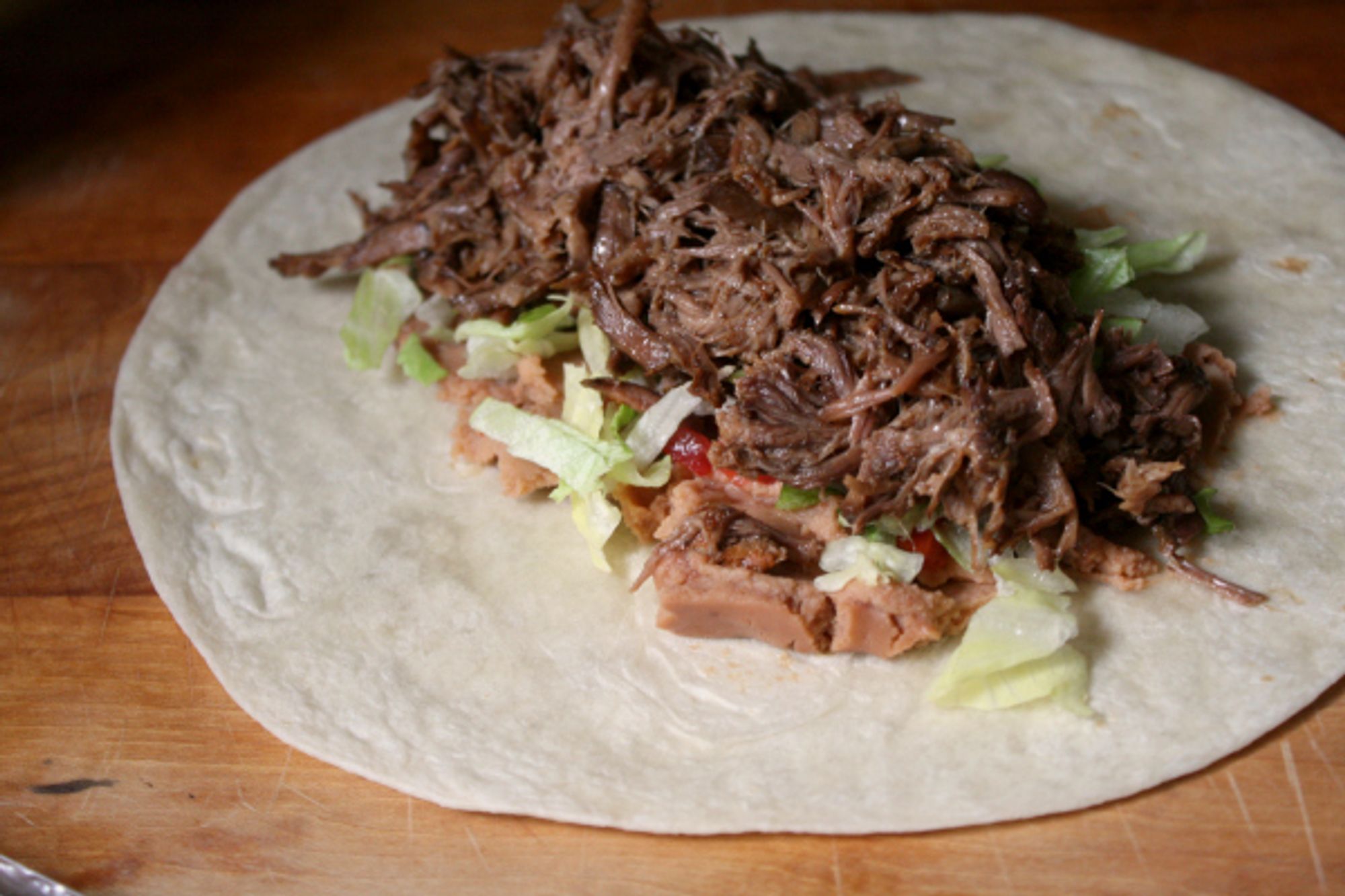 slow-cooker-smothered-beef-burritos-host-the-toast